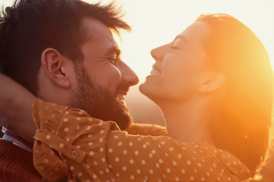 Hangover-IV-Therapy-Clinic A couple embrace in the sunset. Schedule Hangover IV therapy from Christine Collins, MD in Westside/Beverly Hills.