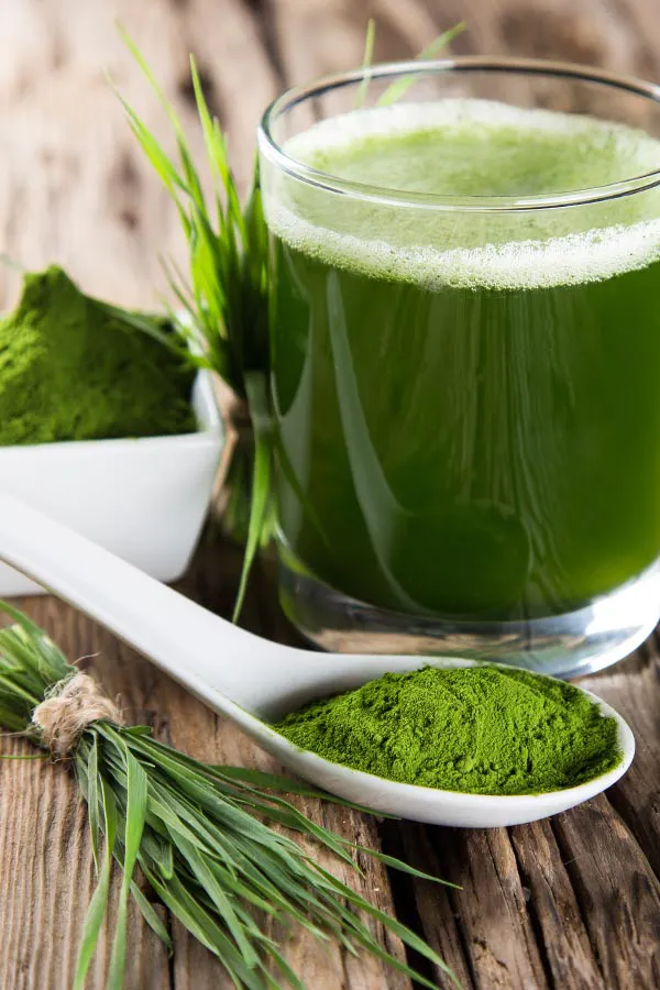 Immune-Boost-Injections-Treatment Healthy green juice and herbs. Get Tri-Immune Boost Injection treatments from Christine Collins, MD in Westside/Beverly Hills.