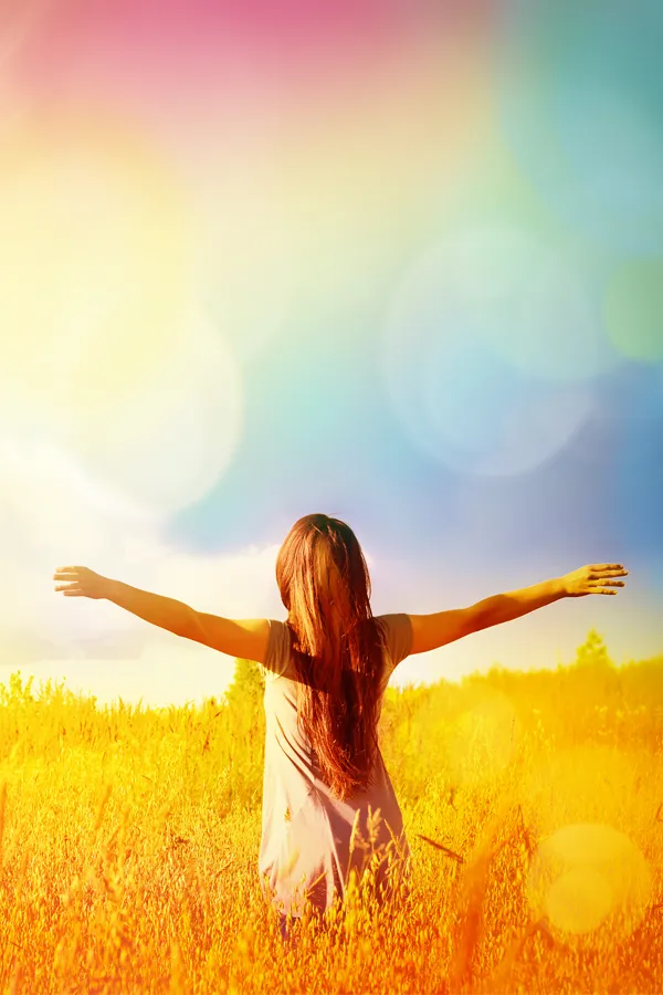 MIC-Vitamin-Injection-Treatment A woman stands in a field with outstretched arms. Get MIC Vitamin Injection treatment from Christine Collins, MD in Westside/Beverly Hills.