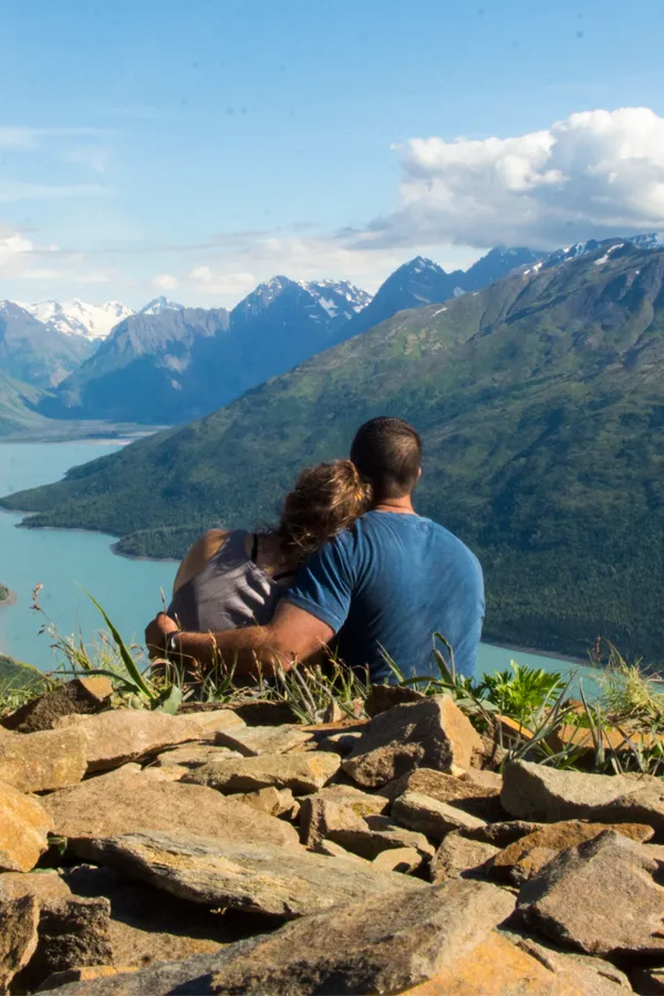 Theta Chamber-Treatment A couple embrace on a mountaintop. Get theta chamber treatment from Christine Collins, MD in Westside/Beverly Hills.
