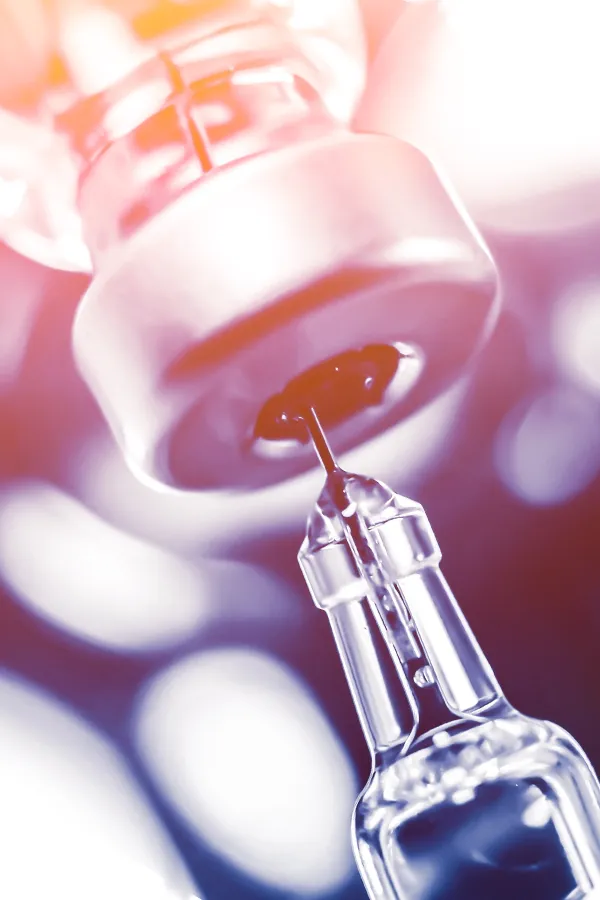 Vitamin-B-Complex-Injection-Treatment A syringe drawing fluid from a vial. Get Vitamin B-Complex Injections from Christine Collins, MD in Westside/Beverly Hills.